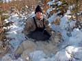 Wayne Bass with a beautiful Gray Timber Wolf. Winter 2009  : click to enlarge.